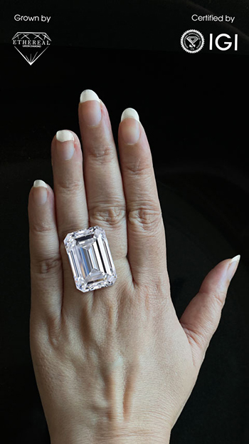 50 carat Emerald cut Lab Created diamond on a hand